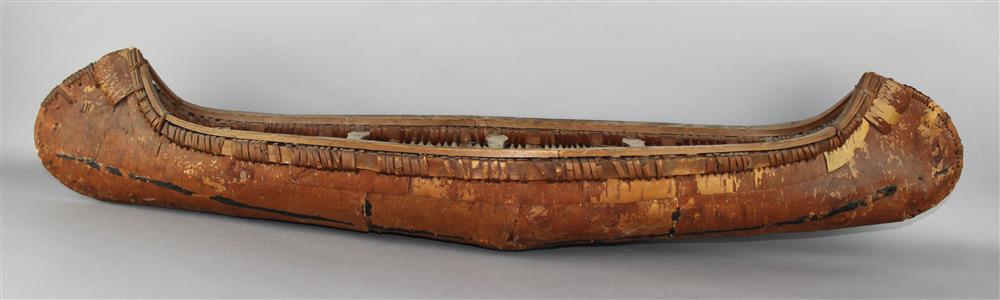 Appraisal: NORTHEASTERN BIRCH BARK MODEL CANOE ribbed interior length in Provenance