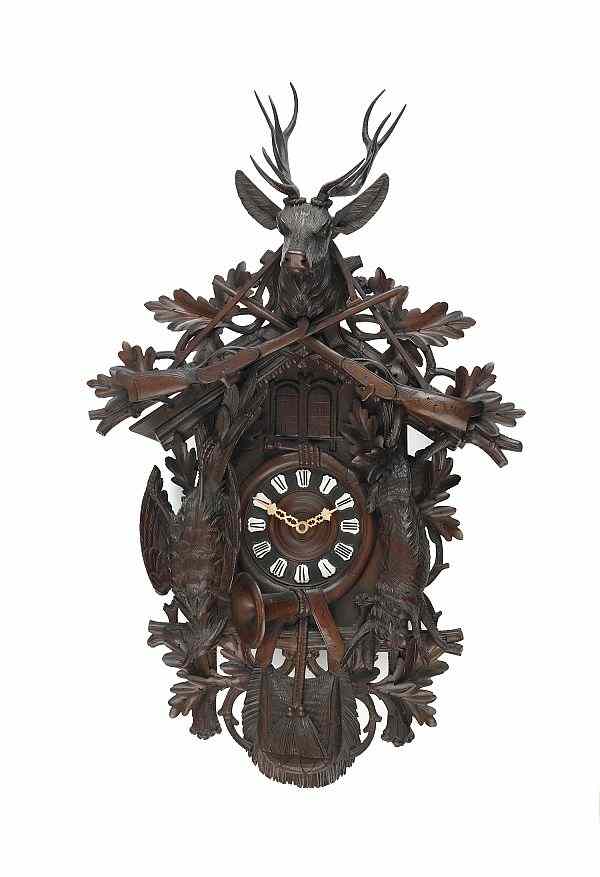 Appraisal: Large Black Forest carved walnut cuckoo clock late th c