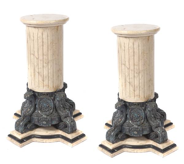 Appraisal: A pair of patinated bronze and marble pedestals height in