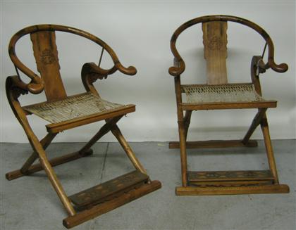 Appraisal: Pair of scroll arm hardwood traveling armchair H in W