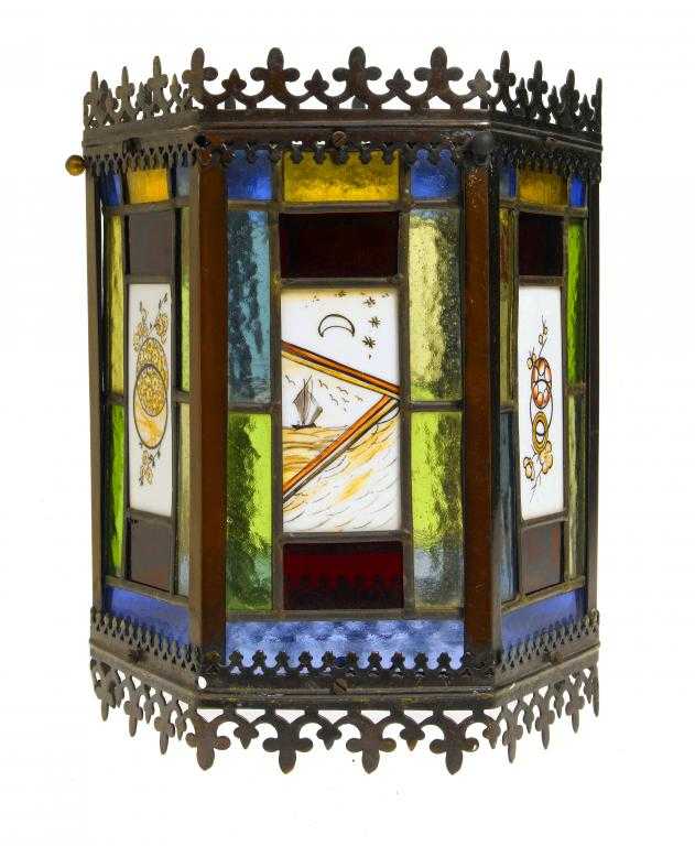 Appraisal: AN AESTHETIC MOVEMENT 'ART METAL' AND LEADED GLASS HALL LANTERN