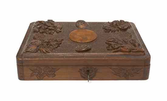 Appraisal: A Continental Carved Walnut Letter Box of rectangular form having