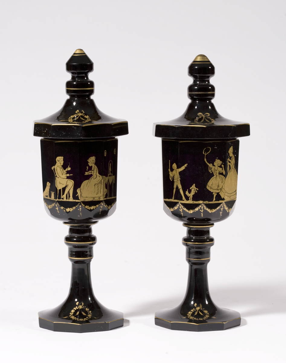 Appraisal: PAIR OF BOHEMIAN AMETHYST PANELLED GLASS COVERED CHALICES WITH GILT