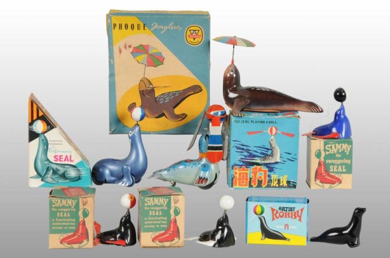 Appraisal: Lot of Tin Seal Toys Description Lot includes one French