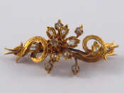 Appraisal: An antique carat gold rose cut diamond brooch approx cm