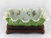 Appraisal: A Chinese ceramic rectangular water bowl or jardinaire moulded as