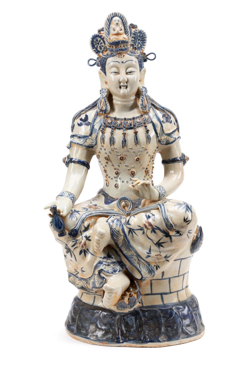 Appraisal: CHINESE BLUE AND WHITE STONEWARE QUAN YIN Chinese blue and