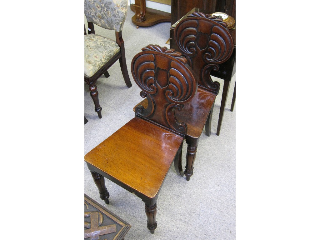 Appraisal: Pair of Victorian mahogany hall chairs