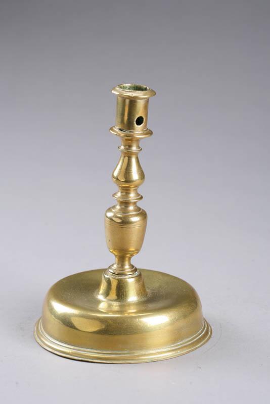 Appraisal: BRASS CANDLESTICK Probably Spanish late th century Baluster form soldered