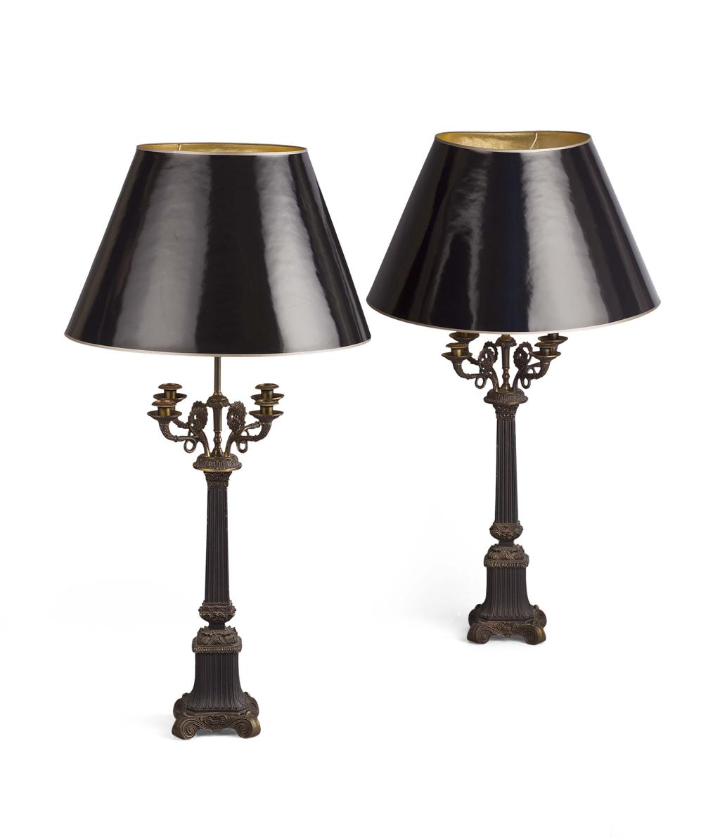 Appraisal: PAIR OF BRONZED METAL LAMPS modelled as candelabra each with