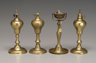 Appraisal: Four early brass lamps three with inverted pear-form font two