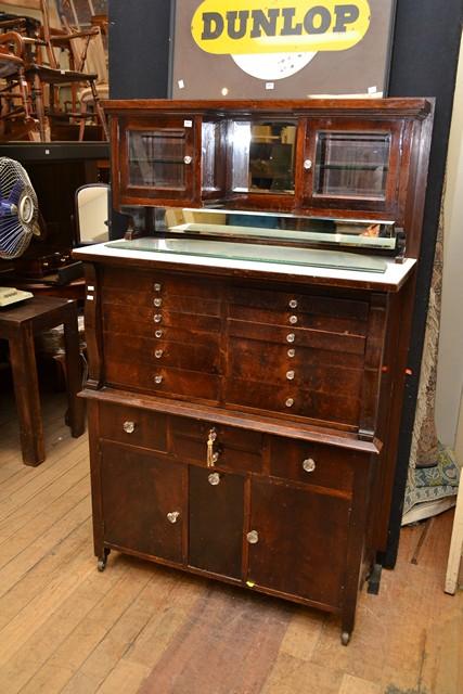 Appraisal: AN EARLY TH CENTURY DENTIST'S CABINET WITH MILK GLASS TOP