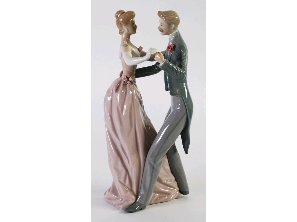 Appraisal: LLADRO PORCELAIN GROUP modelled as a couple dancing typically decorated