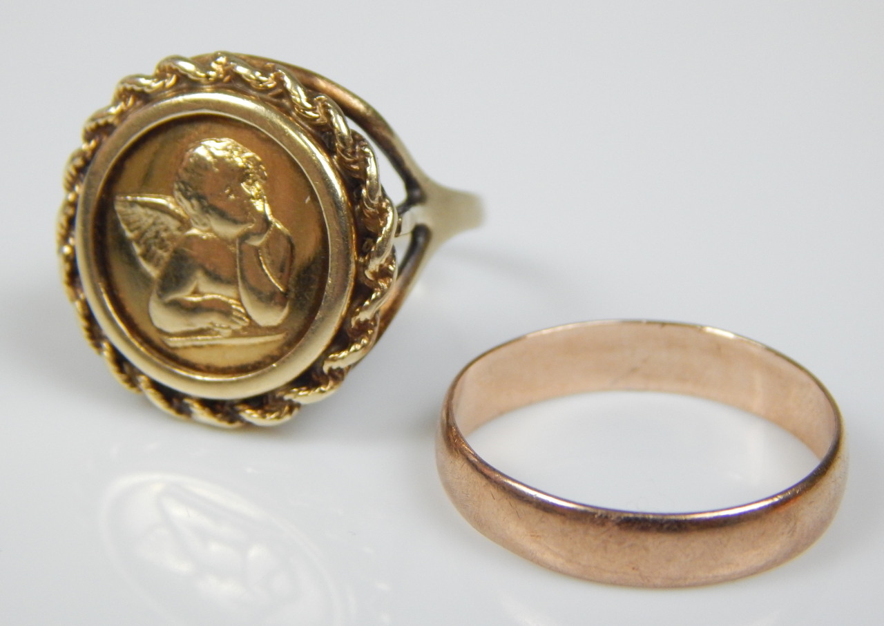 Appraisal: Two ct gold rings to include a wedding band and