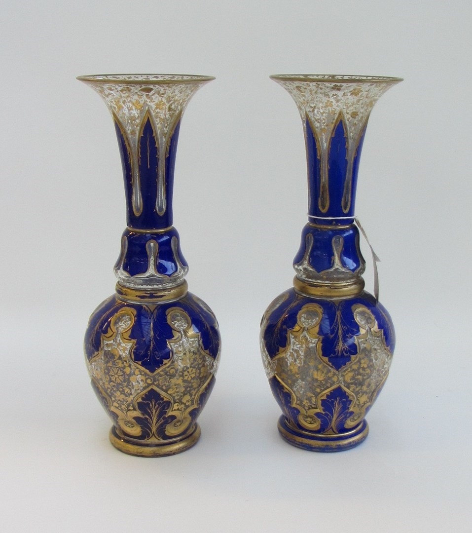 Appraisal: A pair of Bohemian blue glass vases late th century