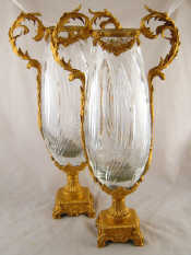 Appraisal: A pair of tall glass vases in fine gilt metal