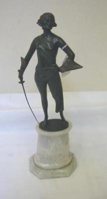 Appraisal: AN ART DECO SPELTER FIGURE of a female fencer in