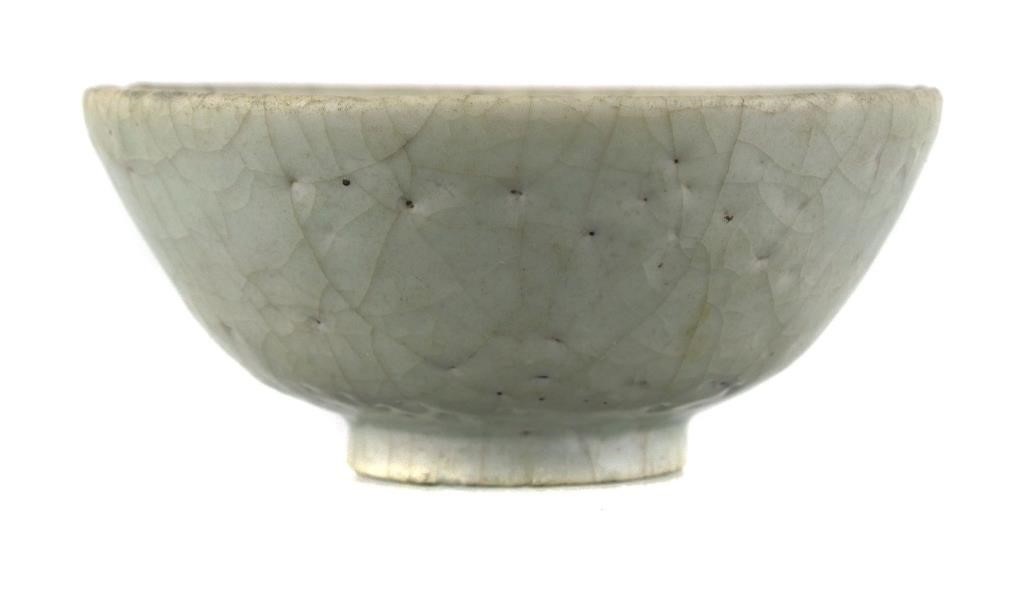 Appraisal: Old Chinese celadon bowl with craquelure throughout Measures high wide