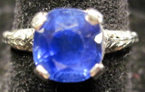 Appraisal: karat white gold and sapphire ringCushion cut in four prong