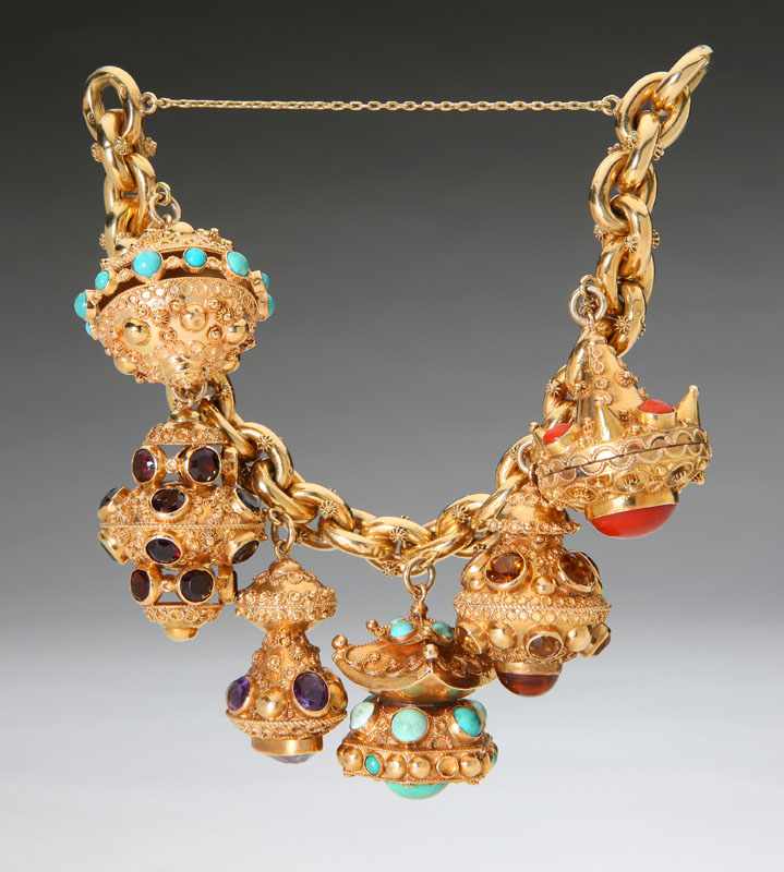 Appraisal: An K yellow gold charm bracelet with gem-set and K