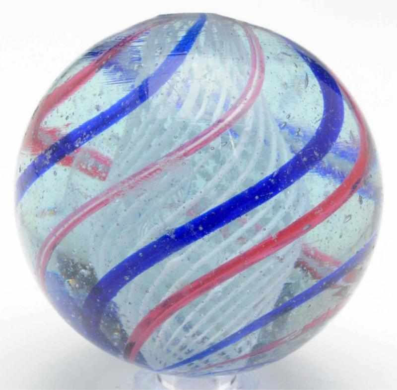 Appraisal: Large White Latticino Swirl Marble Outer decorations of alternating red