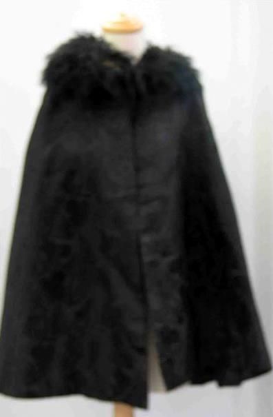 Appraisal: Cape in black floral silk brocade with mohair collar a