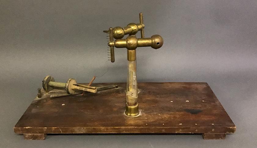 Appraisal: Scientific Instrument Scientific instrument glass brass mounted on a mahogany