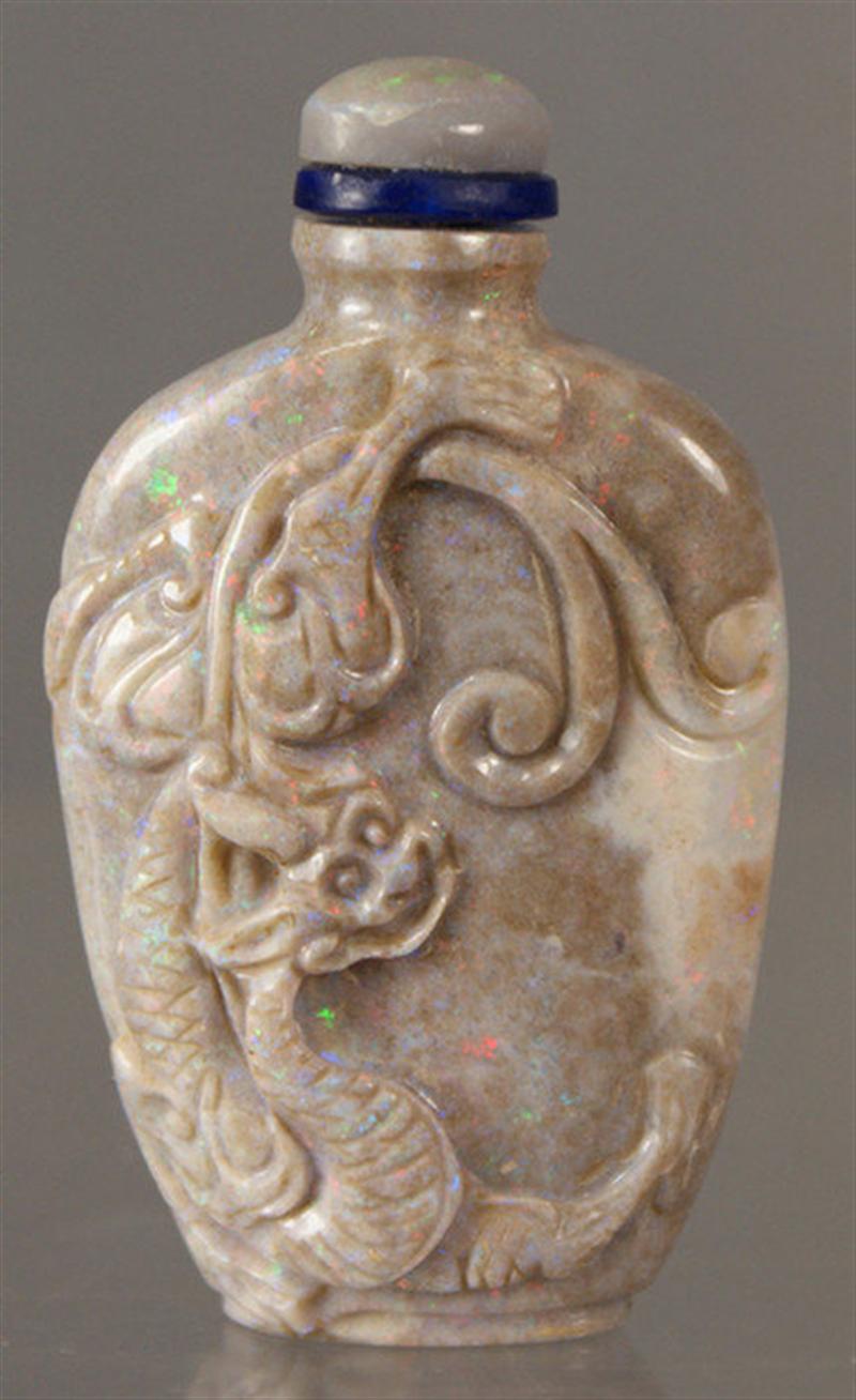 Appraisal: Carved opal snuff bottle relief carved dragon design on front