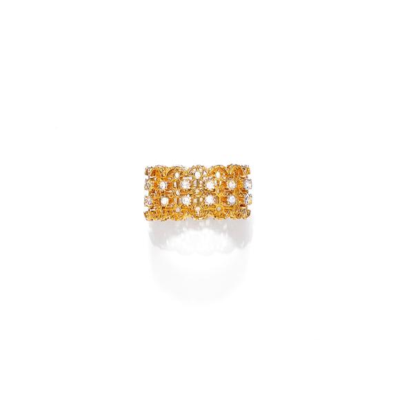 Appraisal: GOLD AND DIAMOND RING Yellow gold Fancy wide band ring