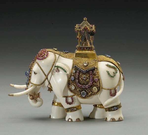 Appraisal: A pieced ivory elephant with gilt metal and colored stone