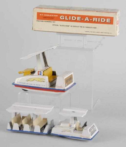 Appraisal: Lot of Tin World's Fair Glide-A-Ride Toys Description Japanese Friction