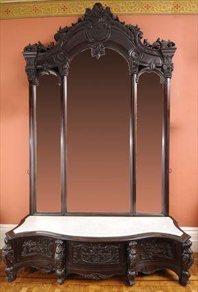 Appraisal: ANGLO-INDIAN ROCOCO-STYLE CARVED HARDWOOD HALL MIRROR AND MARBLE-TOP CONSOLE The