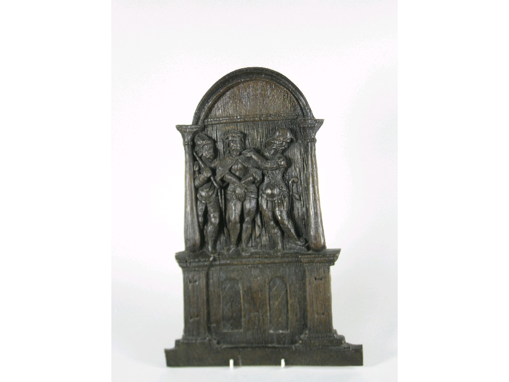 Appraisal: An antique oak Panel with arched top above three figures