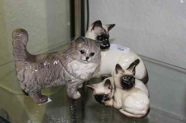 Appraisal: A BESWICK MODEL of a standing cat together with two