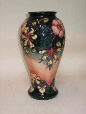 Appraisal: A MOORCROFT POTTERY VASE date mark for of tall baluster