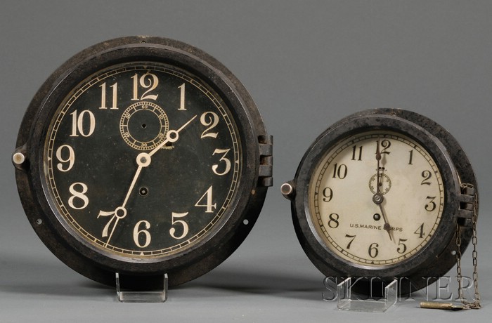 Appraisal: Two Bakelite Cased Military Engine Room Clocks by Chelsea Boston