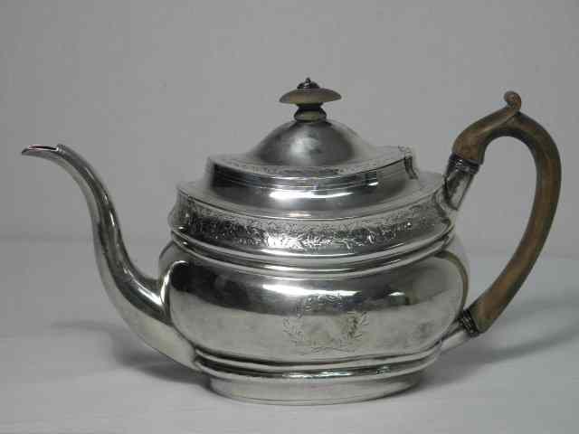 Appraisal: Thomas Wallis II sterling silver teapot Circa with a wooden