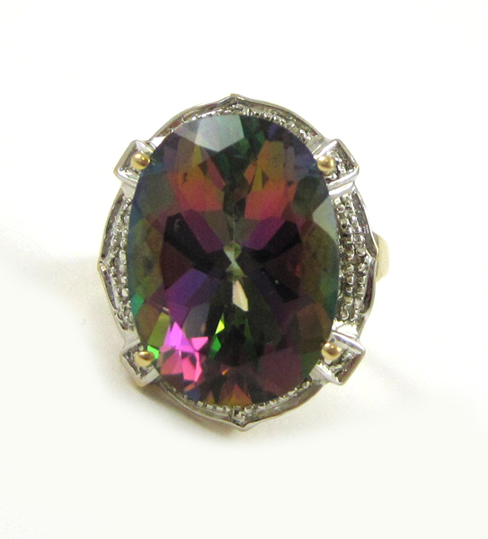 Appraisal: MYSTIC TOPAZ AND FOURTEEN KARAT GOLD RING with round-cut diamonds