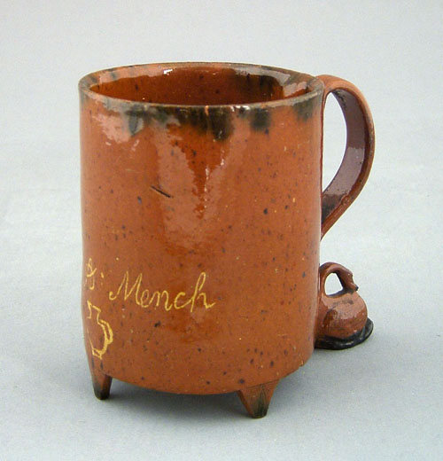 Appraisal: American redware mug dated inscribed J A Mench with swan