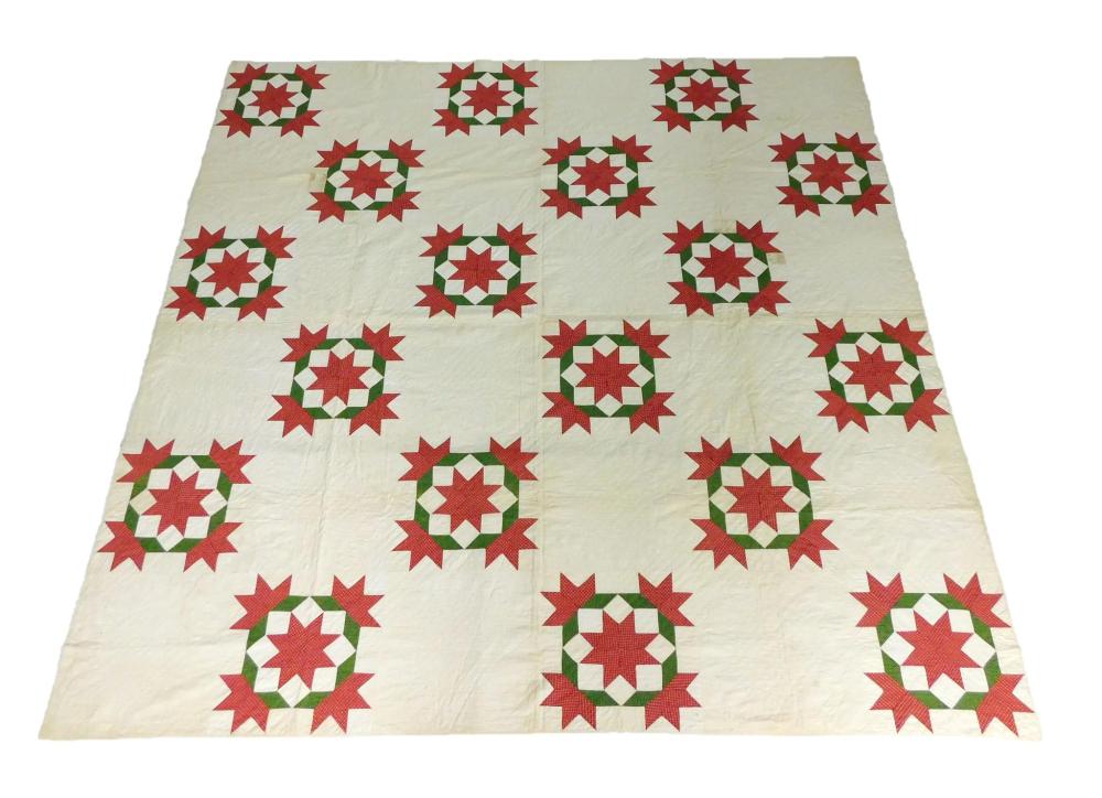 Appraisal: TEXTILE Pieced calico quilt c - with red -pointed stars