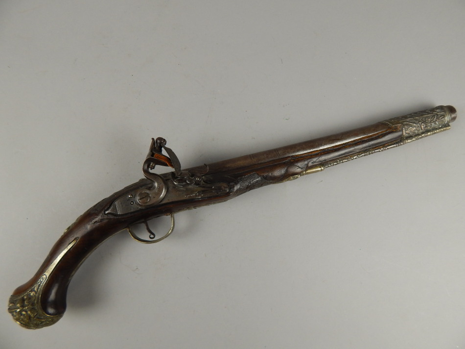 Appraisal: A late thC flintlock pistol the barrel stamped with various