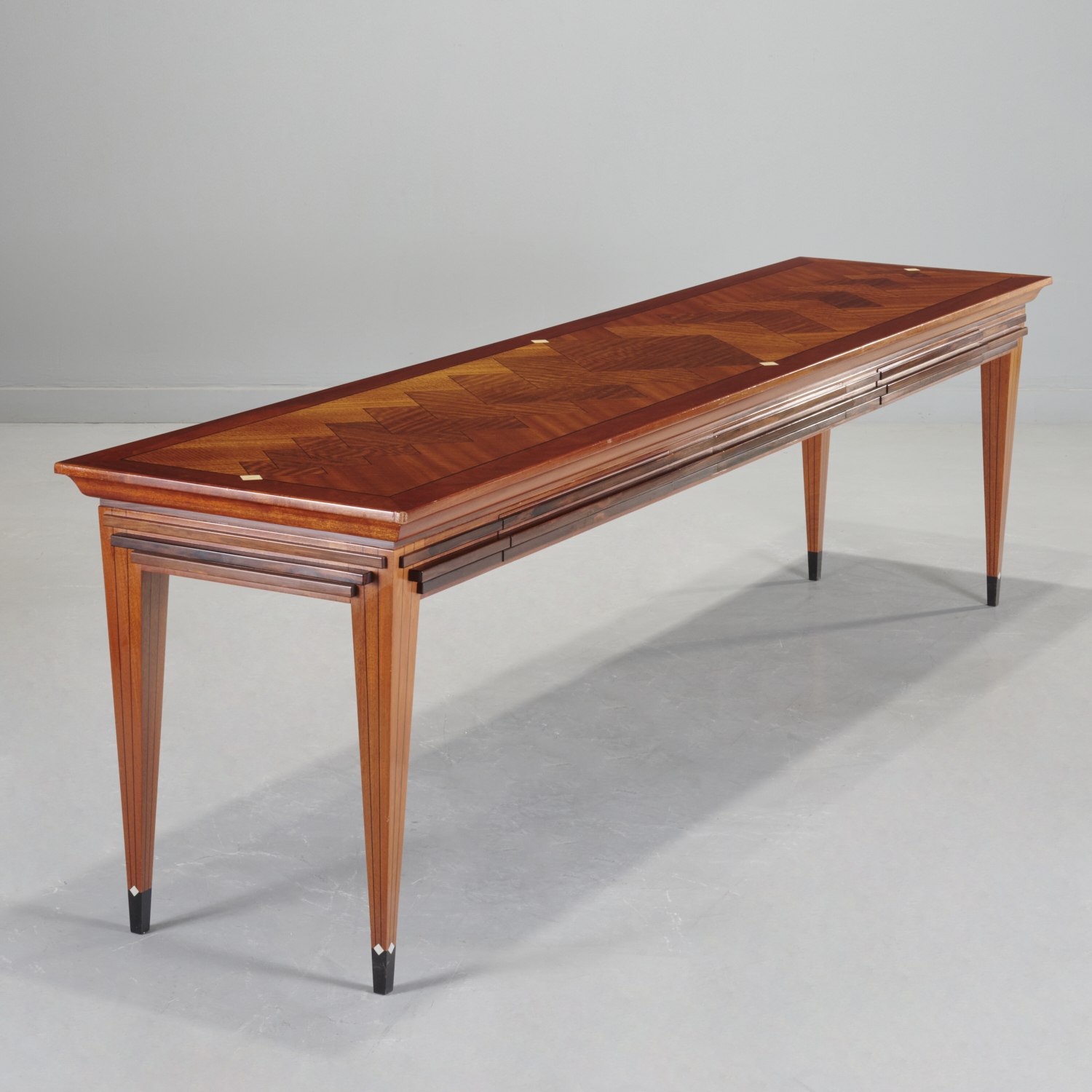 Appraisal: RON PUCKETT STUDIO CRAFT CONSOLE TABLE USA mahogany and veneers