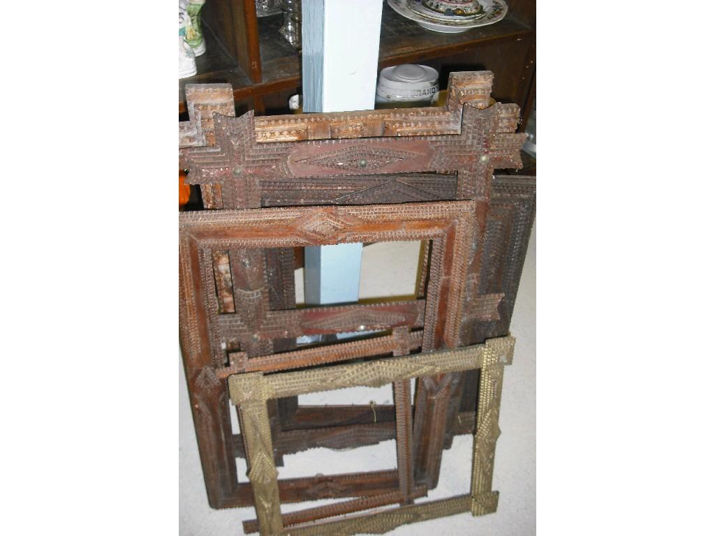 Appraisal: Selection of six Tramp Art frames of varying forms and