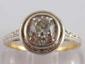 Appraisal: A yellow and white metal tests carat gold diamond solitaire