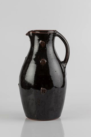 Appraisal: John Jelf British b Jugtenmoku glaze thumb pressed marksimpressed potter's