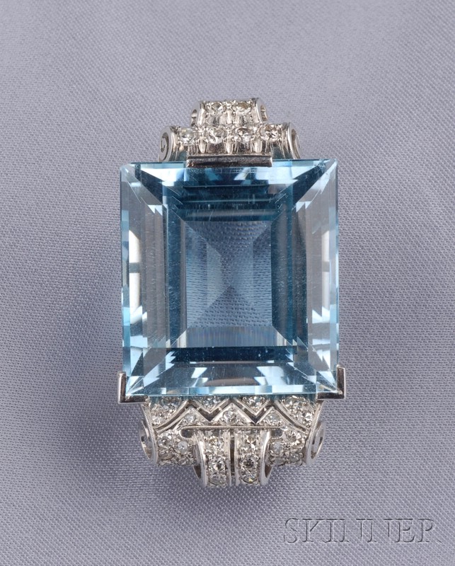 Appraisal: Platinum Aquamarine and Diamond Clip Brooch set with a step-cut