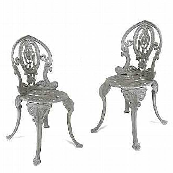 Appraisal: A group of garden furniture comprising two chairs and a