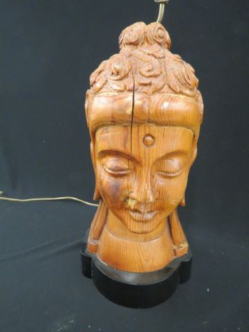 Appraisal: Oriental Carved Wooden Bust of Buddha currently a lamp