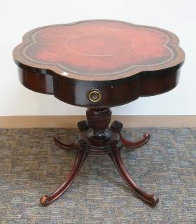 Appraisal: Six Sided Leather Top Saber Legged Table With one drawerDimensions