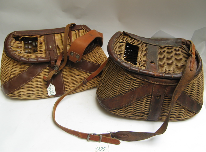 Appraisal: TWO WICKER AND LEATHER ACCENTED FISHING CREELS with shoulder straps